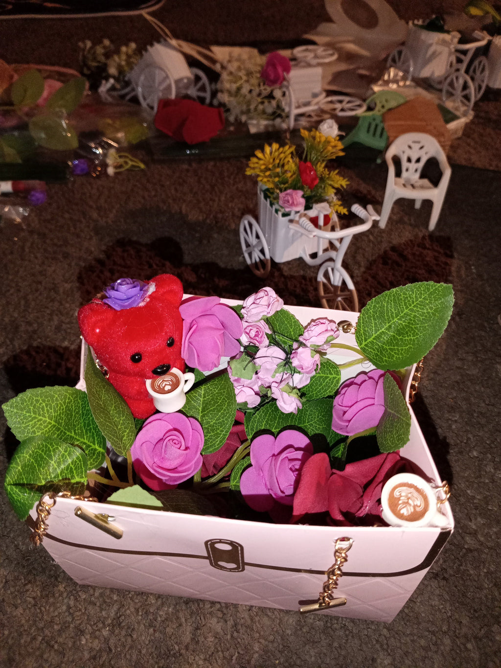 White handbag gift box with purple pink roses and red teddy bear